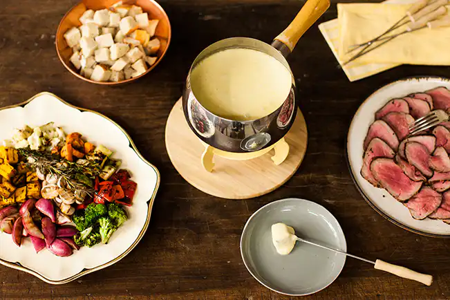 Como fazer um fondue de queijo perfeito: Dicas e truques para uma fondue incrível